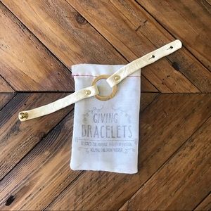 White Leather and Gold Giving Bracelet